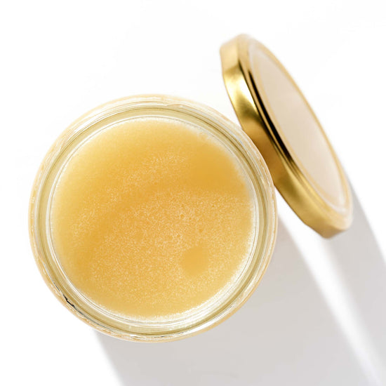 Raw Clover Honey in an open jar, top view – Earthbreath