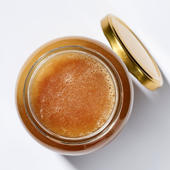 Organic Raw Creamed Heather Honey in an open jar, top view – Earthbreath