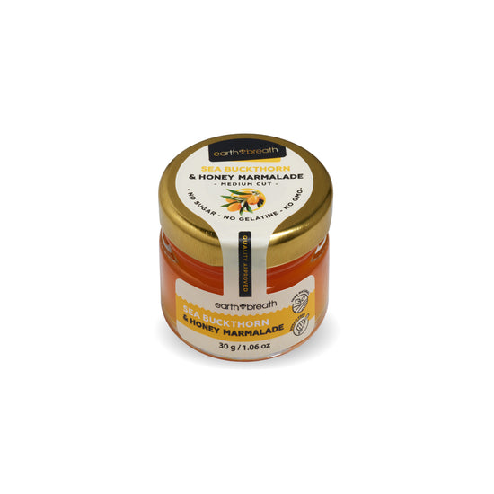 Sea Buckthorn & Honey Marmalade 30g mini jar, angled view of the lid label