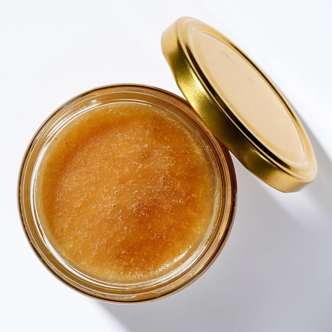 Open jar of Organic Raw Creamed Heather Honey, top view – Earthbreath